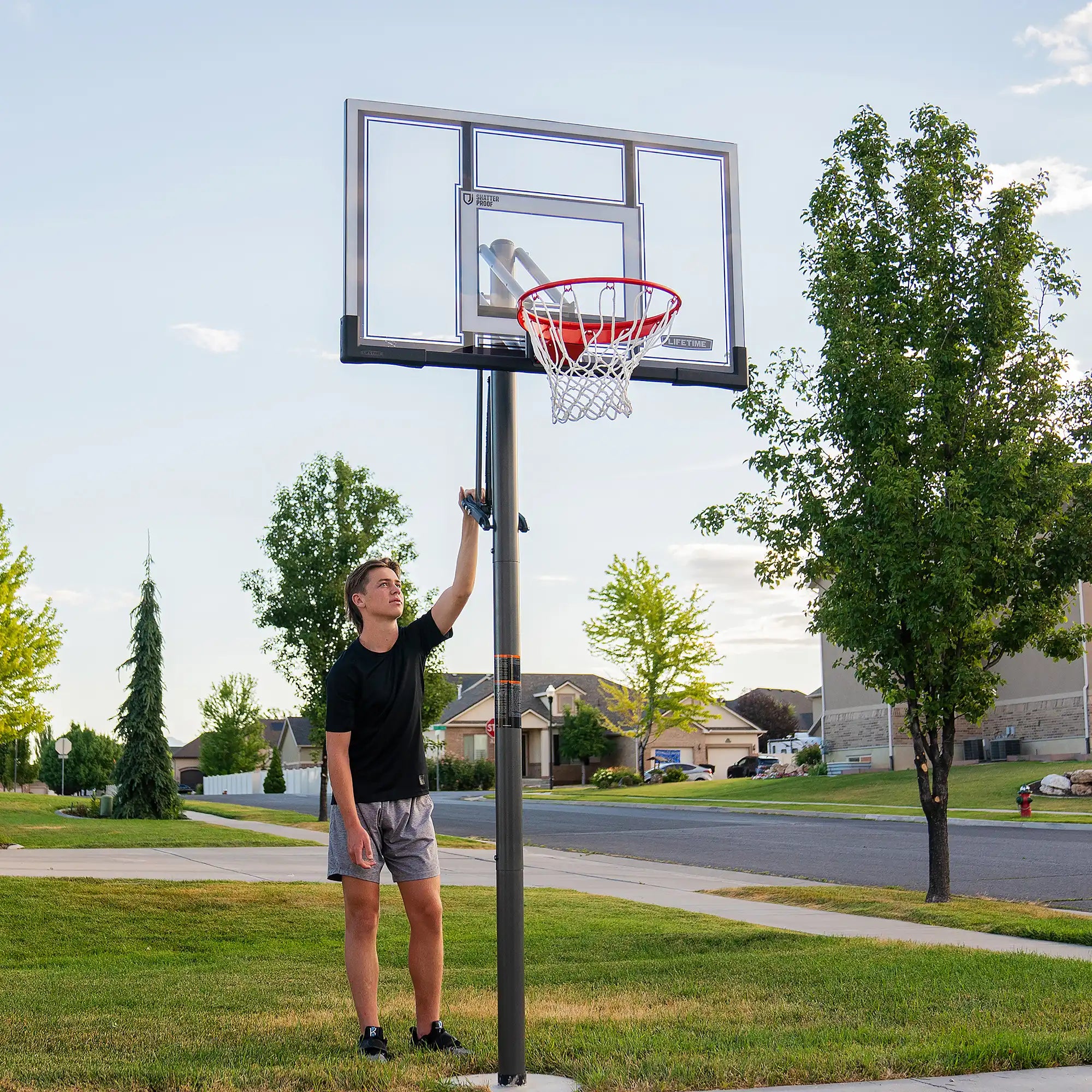 Lifetime Adjustable Round In-Ground Basketball Hoop (54-Inch Polycarbonate)